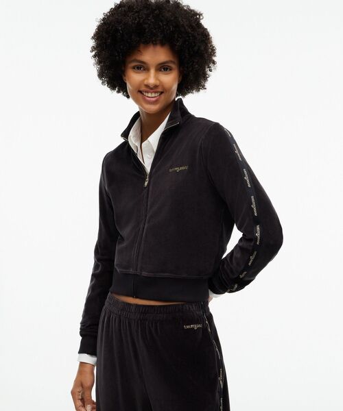 tommy jeans(トミー ジーンズ)の「ロゴテープベロアトラッカージャケット(ブルゾン・レディース・ブラック・SMALL/MEDIUM/X-SMALL)」の1枚目の写真