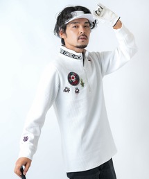 GREED MONSTER（グリードモンスター）の「【GREED MONSTER/グリードモンスター】Jacquard Logo Tape Stand Collar Jacket/ジャガード素材オリジナルワッペンデザインスタンドカラープルオーバーブルゾン（ゴルフウェア）（ゴルフグッズ）」