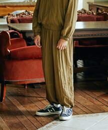 CONICHIWA BONJOUR（コンニチハボンジュール）の「ナイロン トラックパンツ（モカ）（スウェットパンツ）」