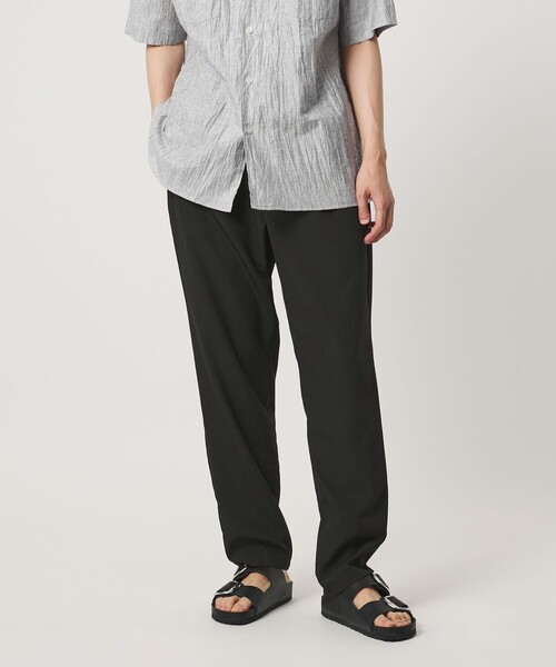 UNITED ARROWS(ユナイテッドアローズ)の「DotAir ドットエア 1プリーツ テーパード パンツ 吸水速乾 タテストレッチ(スラックス・メンズ・ダークブラウン/ブラック・L/XL/M/S)」の1枚目の写真