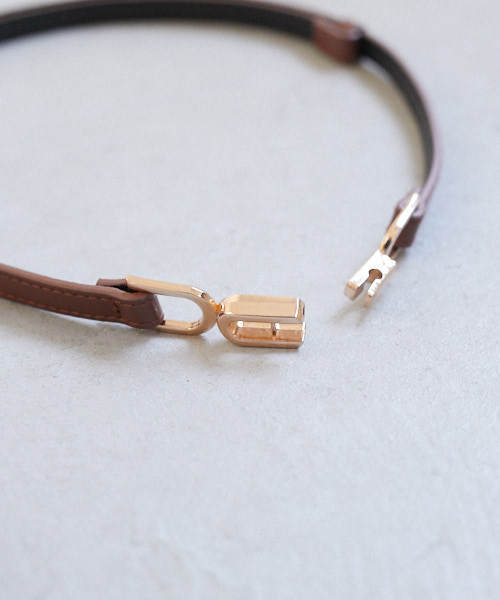 PairPair(ペアペア)の「サイズ調整自由自在!ビットモチーフ付ベルト(ベルト・レディース・ブラック/ダークブラウン・FREE)」の6枚目の写真