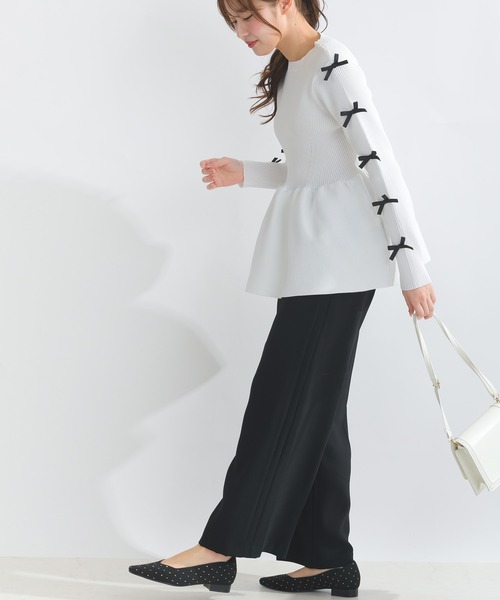 PICCIN PERLA(ピッチンペルラ)の「袖リボンペプラムニット(ニット/セーター・レディース・ブラック/オフホワイト・M)」の8枚目の写真