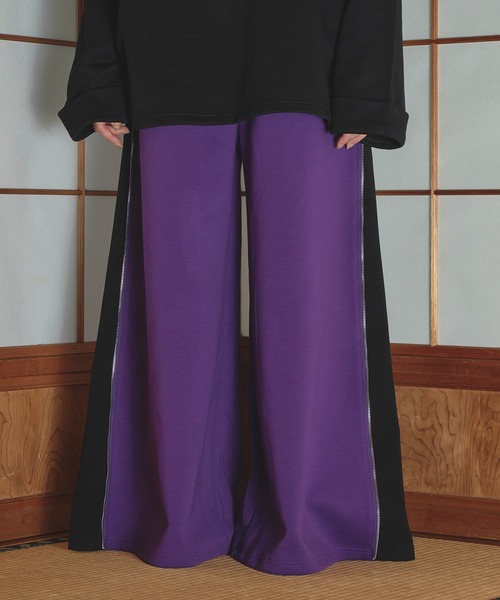 狐独(コドク)の「サイドジップバギートラックパンツ/SETUP対応(その他パンツ・メンズ・パープル/ブラック・LARGE/MEDIUM)」の1枚目の写真