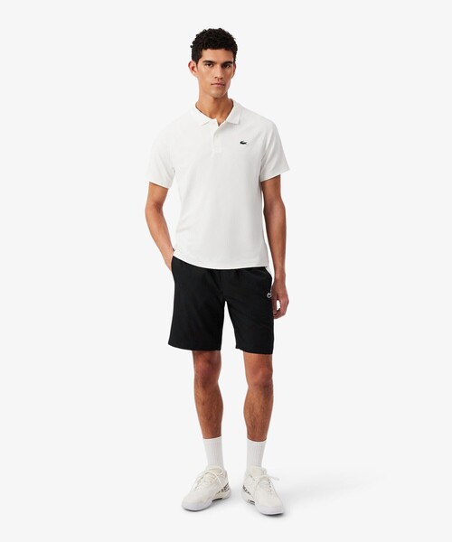 LACOSTE(ラコステ)の「撥水 サイドライン ダイヤモンドタフタショーツ(その他パンツ・メンズ・ブラック・5/3/4)」の2枚目の写真