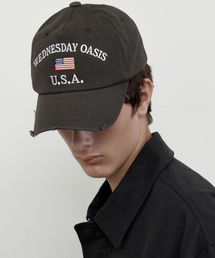 WEDNESDAY OASIS（ウェンズデーオアシス）の「フラッグ ダメージ ボールキャップ_DEEP BROWN(WB6AC07)（キャップ）」