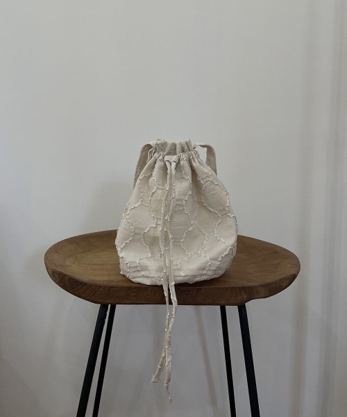 I_am（アイアム）の「wave design purse bag（ハンドバッグ・レディース・ブラック/アイボリー・FREE）」の2枚目の写真