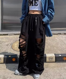 .KOM（ドットコム）の「A'GEM/9 × .kom 『.KOM/ドットケーオーエム』 チェーン付ダメージスウェットパンツ（スウェットパンツ）」