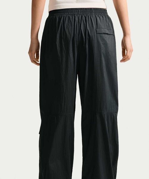 NIKE（ナイキ）の「ナイキ スポーツウェア ウィメンズ ミッドライズ 軽量 UV パンツ / Nike Sportswear Women's Mid-Rise Lightweight UV Pants IO3377-010 Black（その他パンツ・レディース・ブラック・XS/L/M/S/XL）」の9枚目の写真
