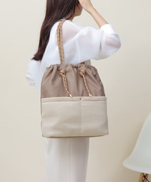 Bermosa（ベルモサ）の「ロープハンドル 巾着 ナイロンバッグ A4サイズ収納可（トートバッグ）」