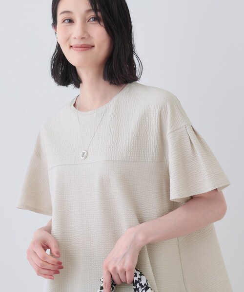 セール】【洗える／体型カバー】凹凸素材フレアデザイントップス