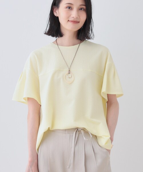 INDIVI（インディヴィ）の「【洗える／体型カバー】凹凸素材フレアデザイントップス（Tシャツ/カットソー・レディース・ブラック/ホワイト/イエロー系その他/サックスブルー/ナチュラル・05/13/34/38/15 ）」の5枚目の写真
