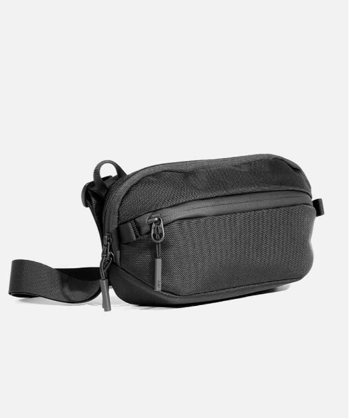 Aer(エアー)の「【Aer / エアー】 Travel Collection Day Sling 3 X-Pac(ショルダーバッグ・メンズ・ブラック・FREE)」の1枚目の写真