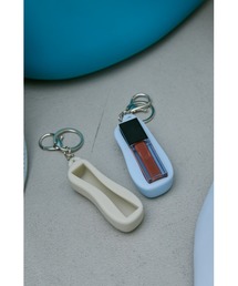 un/neu（アンノイ）の「シリコンリップチャーム（チャーム）」