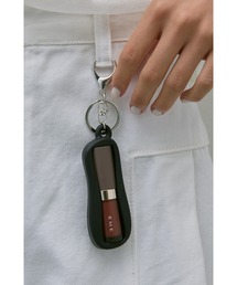 un/neu（アンノイ）の「シリコンリップチャーム（チャーム）」