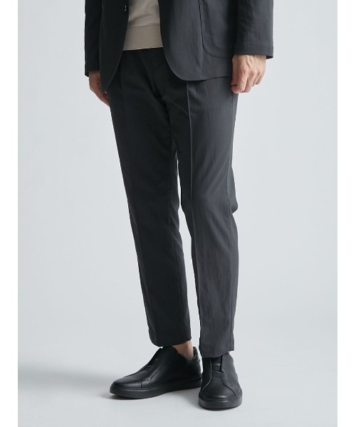 AOURE(アウール)の「VINTAGE NYLON SETUP PANTS(スラックス・メンズ・チャコールグレー/ライトベージュ/カーキ・LARGE/MEDIUM)」の1枚目の写真