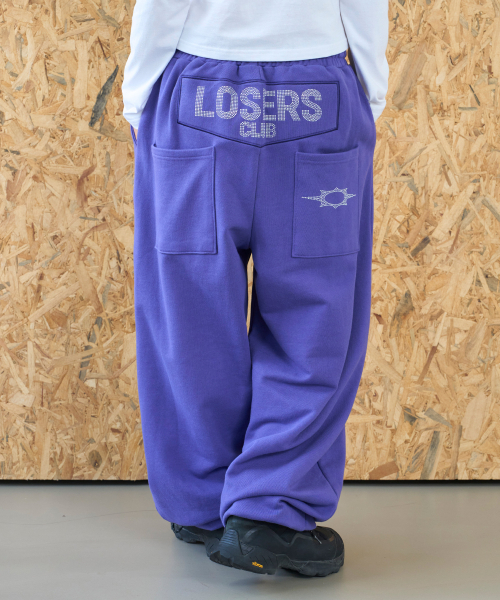 LOSERS CLUB（ルーザーズクラブ）の「ホットフィックスポケット付きワイドスウェットパンツ パープル（スウェットパンツ・レディース・その他・SMALL/MEDIUM）」の4枚目の写真