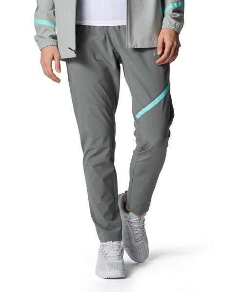 UNDER ARMOUR(アンダーアーマー)の「UAウーブン パンツ(トレーニング/レディース)(その他パンツ・レディース・イエロー系・M/XL/L/S)」の1枚目の写真