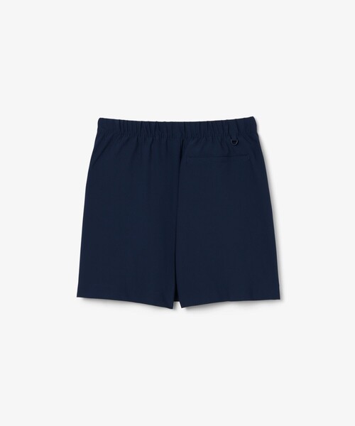 LACOSTE(ラコステ)の「吸汗速乾 ウルトラドライ フラップデザインストレッチテニスショーツ / ミニスカート(スカート・レディース・ネイビー/ホワイト・36/38/34)」の6枚目の写真