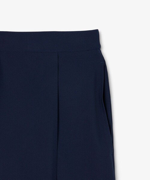 LACOSTE(ラコステ)の「吸汗速乾 ウルトラドライ フラップデザインストレッチテニスショーツ / ミニスカート(スカート・レディース・ネイビー/ホワイト・36/38/34)」の7枚目の写真