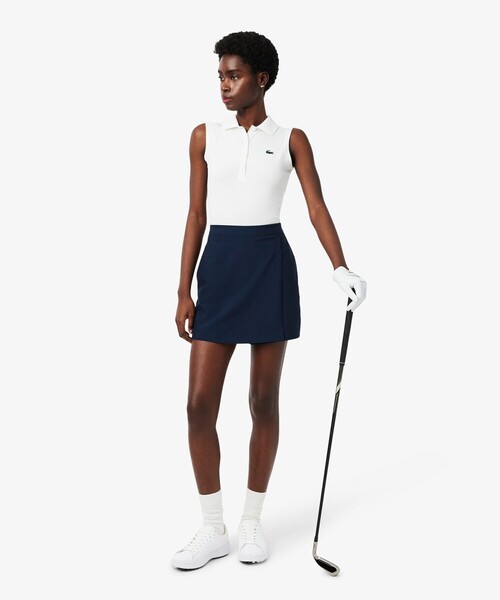 LACOSTE(ラコステ)の「吸汗速乾 ウルトラドライ フラップデザインストレッチテニスショーツ / ミニスカート(スカート・レディース・ネイビー/ホワイト・36/38/34)」の12枚目の写真
