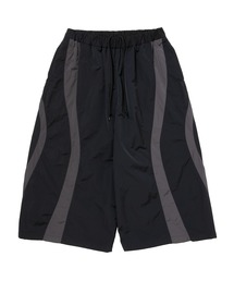 COOTIE PRODUCTIONS | Nylon Paneling Shin Cut Wide Track Pants(その他パンツ)
