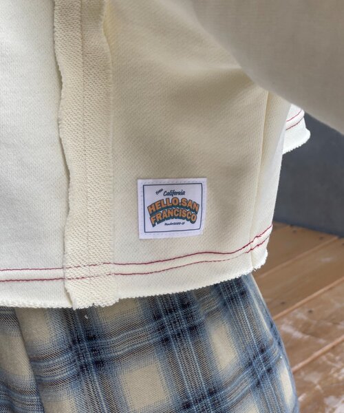 HELLO.SANFRANCISCO（ハローサンフランシスコ）の「【HELLO.SANFRANCISCO】フラワーフリルクロップドスウェット（スウェット・レディース・ネイビー/オレンジ/アイボリー・ONE SIZE）」の11枚目の写真