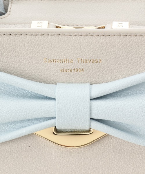 Samantha Thavasa(サマンサタバサ)の「バイカラーリボンモチーフ スプリットレザーハンドバッグ(ハンドバッグ・レディース・ベージュ/イエロー/ライトブルー・FREE)」の6枚目の写真