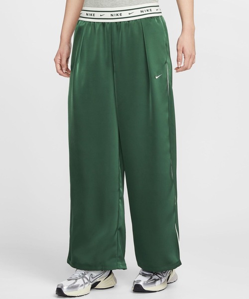 NIKE(ナイキ)の「NIKE AS W NSW OFFLN WVN STN PANT / ナイキ ウィメンズ NSW OFFLN ウーヴン STN パンツ 【SP】(その他パンツ・レディース・グリーン/ブラック・S/L/M)」の1枚目の写真