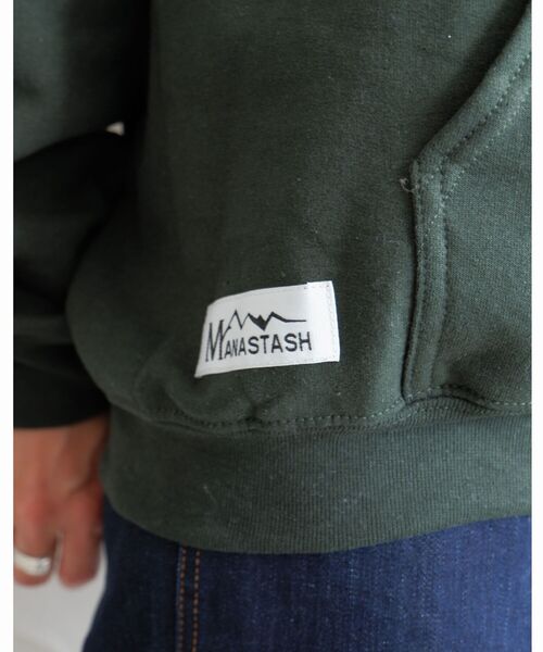 MANASTASH(マナスタッシュ)の「MANASTASH/マナスタッシュ W's SMILE EMB HOODIE ウィメンズスマイルエンブレムフーディー パーカー(パーカー・レディース・ホワイト/ブラック/ダークグリーン・MEDIUM)」の10枚目の写真