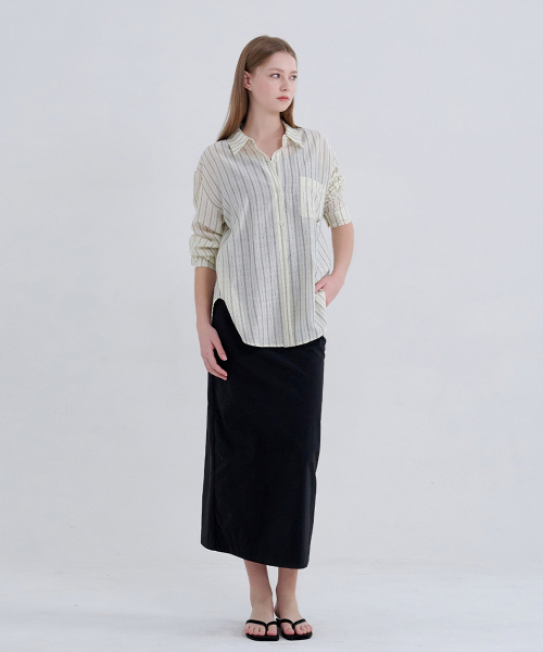 MICANE（ミケーネ）の「サバスタンダードフィットロングスカート（スカート・レディース・ブラック/アイボリー・X-SMALL/SMALL/MEDIUM/LARGE/X-LARGE/XX-LARGE）」の5枚目の写真