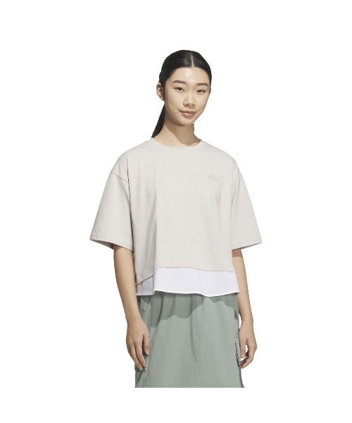 adidas(アディダス)の「アディダス adidas レイヤード ルーズフィット半袖コットンTシャツ(Tシャツ/カットソー・レディース・ベージュ/ブラック・S/M/L/XL)」の1枚目の写真