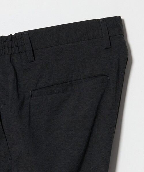 UNITED ARROWS（ユナイテッドアローズ）の「ウェザーコンフォート メランジ サイドシャーリング 1プリーツ パンツ 撥水 ヨコストレッチ（スラックス・メンズ・ブラック/ダークグレー・L/S/M/XL）」の6枚目の写真