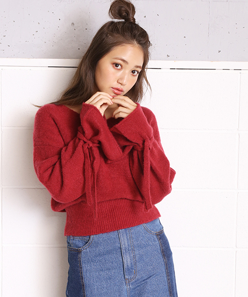one after another NICE CLAUP（ワンアフターアナザーナイスクラップ）の「袖リボンもちもちニット（ニット/セーター・レディース・ピンク/レッド/アイボリー/ブラック・FREE）」の1枚目の写真