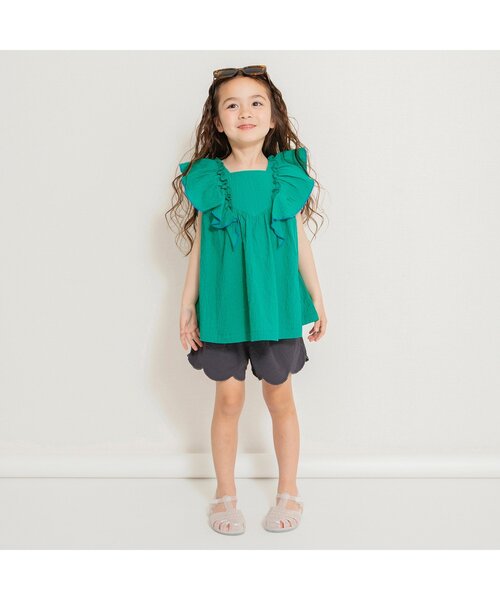 BREEZE（ブリーズ）の「【ジュニア対応】フリルチュニック（シャツ/ブラウス・キッズ・オフホワイト/グリーン/ピンク/チャコール・80/90/100/110/120/130/140）」の5枚目の写真