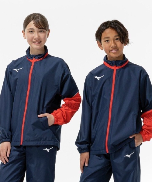 MIZUNO(ミズノ )の「ミズノ JRブレスウォーマジャケット(ジャージ・キッズ・ブラック×レッド/ネイビー・130cm/140cm/150cm/160cm)」の1枚目の写真