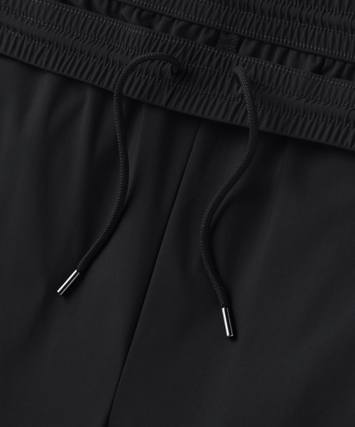 MUSINSA STANDARD（ムシンサスタンダード）の「クーリングルーズテーパードバンディングパンツ[ブラック]（スウェットパンツ・メンズ・その他・26/28/30/32/34/36/38/40/42）」の4枚目の写真
