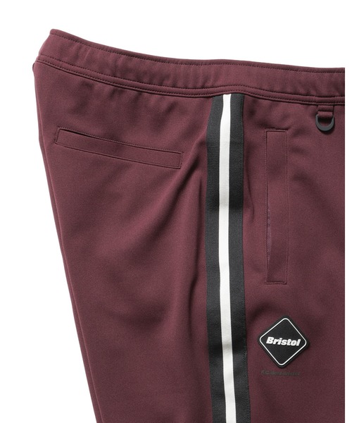 TRAINING TRACK RIBBED PANTS（その他パンツ）｜F.C.Real