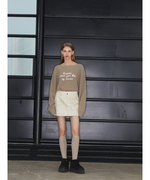 ANOETIC(アノエティック)の「GOLD LOGO MINI SKIRT_IVORY(スカート・レディース・アイボリー・SMALL/MEDIUM)」の1枚目の写真