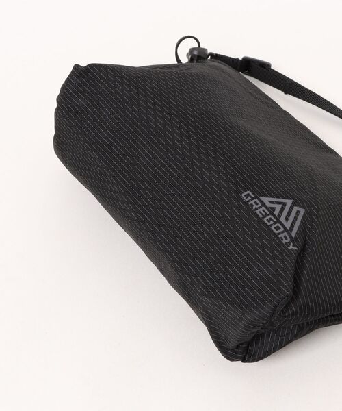 GREGORY(グレゴリー)の「【GREGORY】グレゴリー NANO CROSSBODY POUCH ナノクロスボディポーチ(エコバッグ/サブバッグ・レディース・ブラック/オフホワイト・FREE)」の4枚目の写真