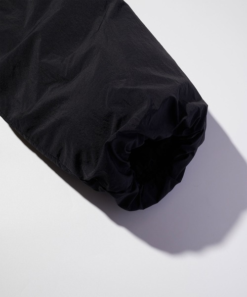 Arnold Palmer(アーノルドパーマー)の「スタンド パファージャケット(その他アウター・レディース・サックスブルー/アイボリー/ブラック・L/M/S)」の11枚目の写真