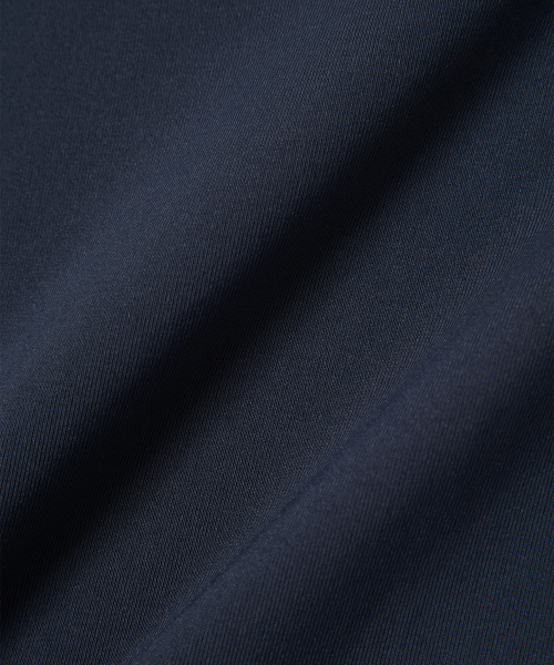 WOOALONG（ウアロン）の「Nylon Buttoned Crop T-shirt [Fabric by ITALY] - NAVY（Tシャツ/カットソー・レディース・ネイビー・SMALL/MEDIUM）」の6枚目の写真