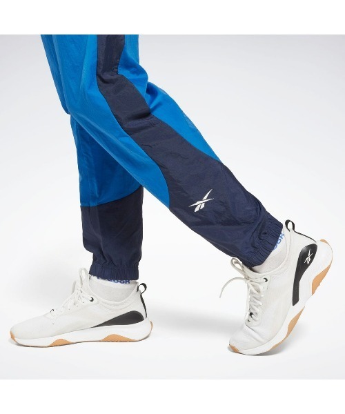 Reebok（リーボック）の「トレイン ウーブン パンツ / TRAIN WOVEN PANT（スウェットパンツ・メンズ・ブラック/ブルー・X-SMALL/SMALL/MEDIUM/LARGE/X-LARGE/XX-LARGE/XXX-LARGE）」の5枚目の写真