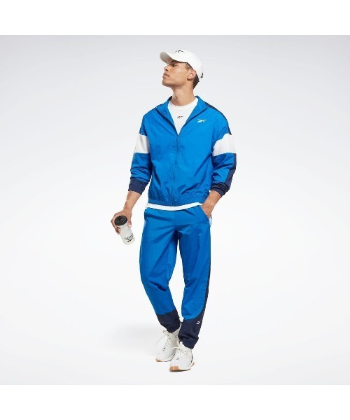 Reebok（リーボック）の「トレイン ウーブン パンツ / TRAIN WOVEN PANT（スウェットパンツ・メンズ・ブラック/ブルー・X-SMALL/SMALL/MEDIUM/LARGE/X-LARGE/XX-LARGE/XXX-LARGE）」の3枚目の写真