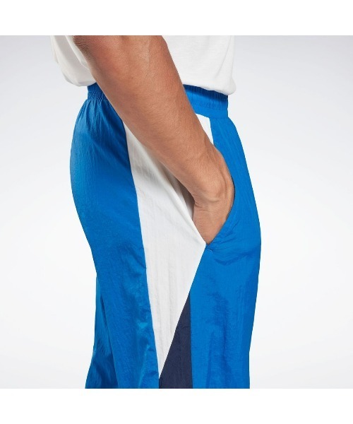 Reebok（リーボック）の「トレイン ウーブン パンツ / TRAIN WOVEN PANT（スウェットパンツ・メンズ・ブラック/ブルー・X-SMALL/SMALL/MEDIUM/LARGE/X-LARGE/XX-LARGE/XXX-LARGE）」の6枚目の写真