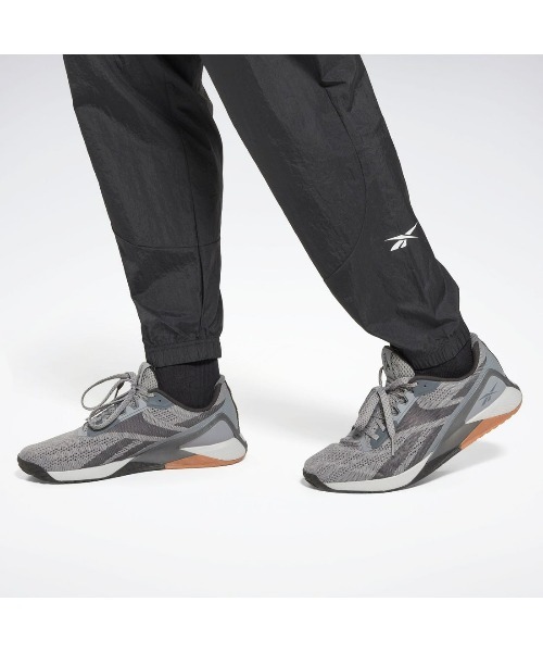 Reebok（リーボック）の「トレイン ウーブン パンツ / TRAIN WOVEN PANT（スウェットパンツ・メンズ・ブラック/ブルー・X-SMALL/SMALL/MEDIUM/LARGE/X-LARGE/XX-LARGE/XXX-LARGE）」の9枚目の写真