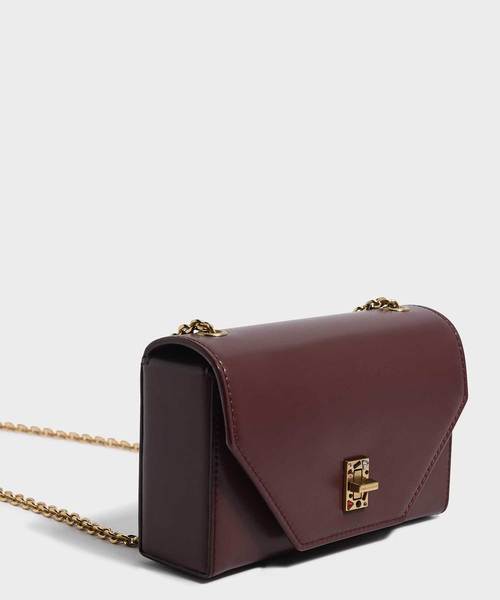 CHARLES & KEITH(チャールズ & キース)の「エンベリッシュターンロッククラッチ / EMBELLISHED TURN-LOCK CLUTCH(クラッチバッグ・レディース・ブラック/ブロンズ/アイボリー/バーガンディー・S)」の16枚目の写真