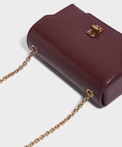 CHARLES & KEITH(チャールズ & キース)の「エンベリッシュターンロッククラッチ / EMBELLISHED TURN-LOCK CLUTCH(クラッチバッグ・レディース・ブラック/ブロンズ/アイボリー/バーガンディー・S)」の17枚目の写真