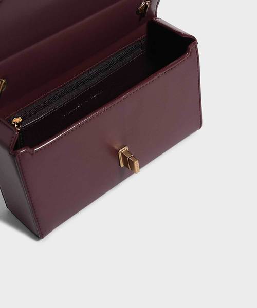 CHARLES & KEITH(チャールズ & キース)の「エンベリッシュターンロッククラッチ / EMBELLISHED TURN-LOCK CLUTCH(クラッチバッグ・レディース・ブラック/ブロンズ/アイボリー/バーガンディー・S)」の18枚目の写真