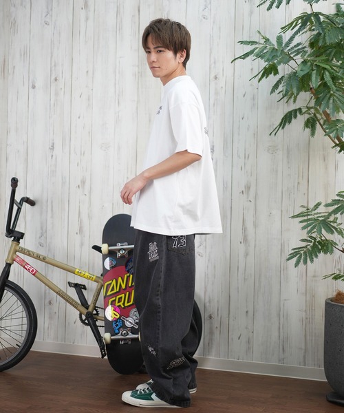 LURKING CLASS（ラーキングクラス）の「【ムラサキスポーツ限定】LURKING CLASS/ラーキングクラス 半袖Tシャツ バックプリント ST25STM03（Tシャツ/カットソー・メンズ・オレンジ/ホワイト/ブラック・XL/L/M）」の9枚目の写真