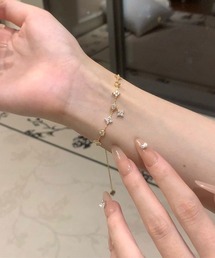 almo（アルモ）の「ミニフラワーモチーフゴールドブレスレット(LEY)（ブレスレット）」